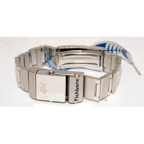 340 - Fishbone branded stainless steel 'reverso' watch/bracelet and stand