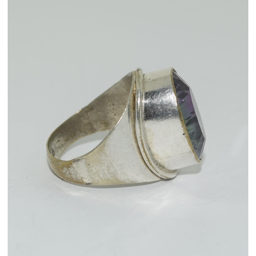 388 - Silver and mystic topaz ring. Size Q.