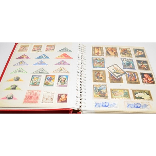 214 - Collection of mostly Hungary stamps contained within three albums