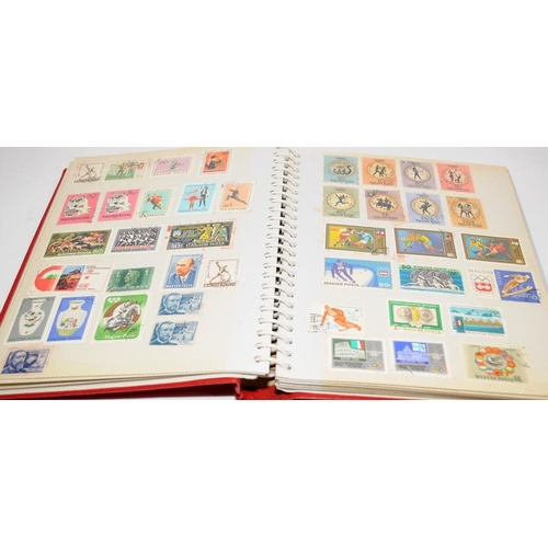 214 - Collection of mostly Hungary stamps contained within three albums