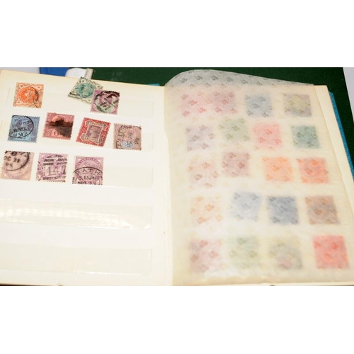 215 - Collection of stamps in four albums to include a small stock book of early GB, an album mainly featu... 