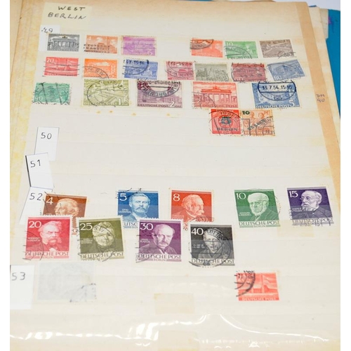 215 - Collection of stamps in four albums to include a small stock book of early GB, an album mainly featu... 