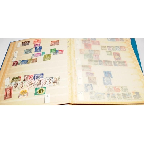 215 - Collection of stamps in four albums to include a small stock book of early GB, an album mainly featu... 