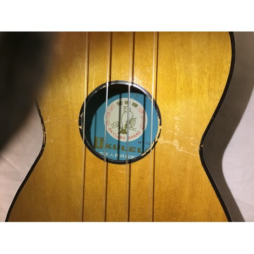 156 - VINTAGE WOODEN UKULELE. This model comes in its original box and has the MY-107 model number. Found ... 