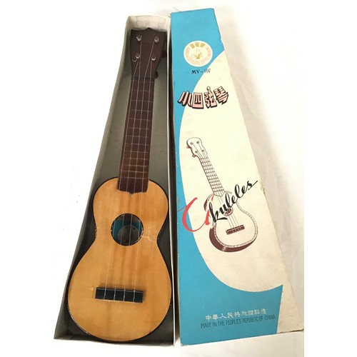 156 - VINTAGE WOODEN UKULELE. This model comes in its original box and has the MY-107 model number. Found ... 