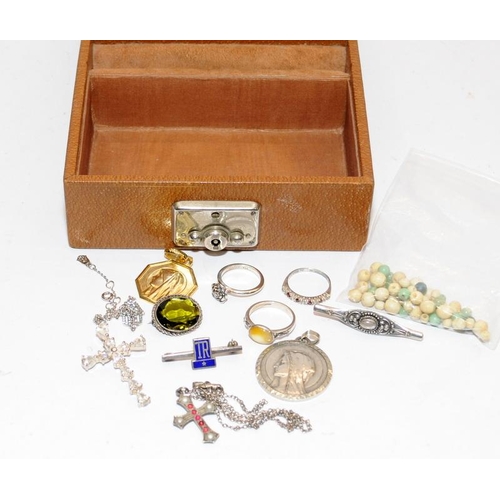 439 - A small quantity of silver and other jewellery in a leather bound wooden box