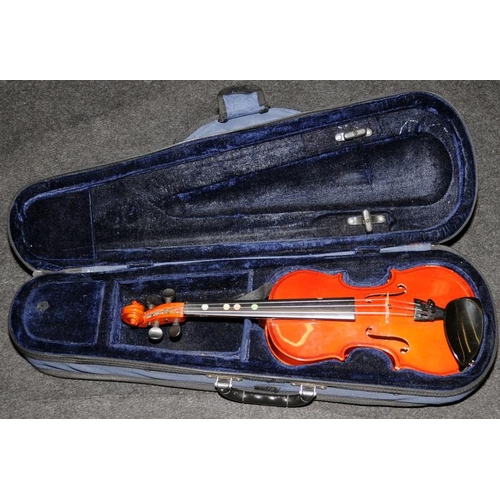 148 - Four cased violins to include vintage examples