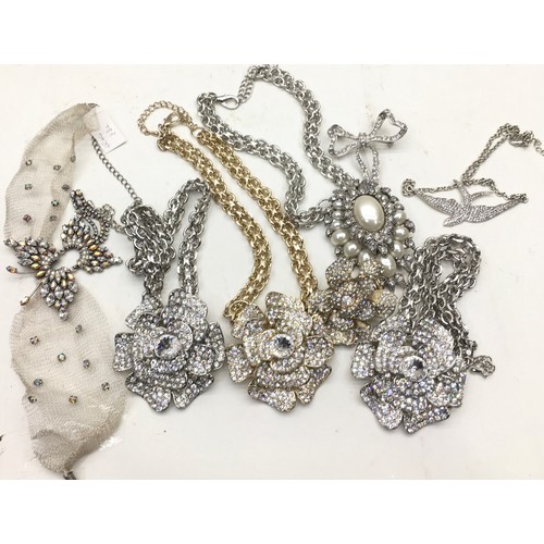 509 - Quantity of new diamanté costume jewellery to include necklaces, pendants and brooches