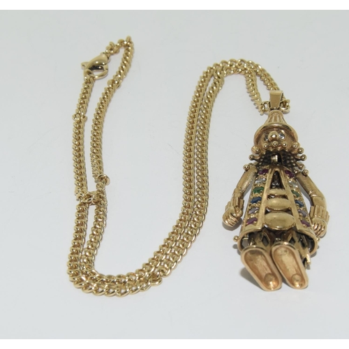 357 - 9ct gold Articulated clown figure on a gold chain set with semi precious stones clown 7cm chain 46cm... 