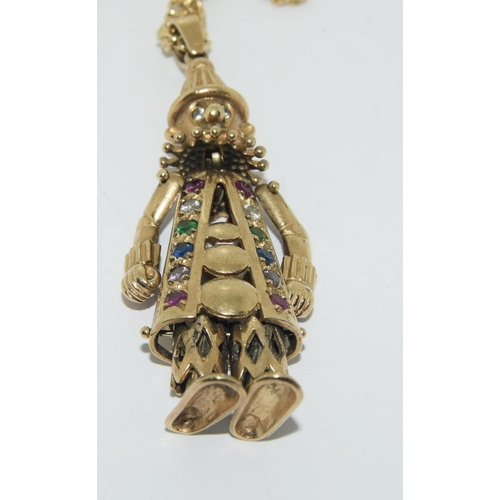 357 - 9ct gold Articulated clown figure on a gold chain set with semi precious stones clown 7cm chain 46cm... 