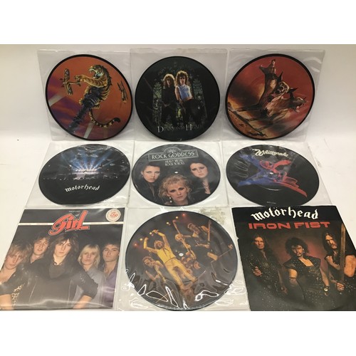 226 - SELECTION OF METAL PIC AND COLOURED 7” SINGLES. This selection includes - Motörhead - Saxon - Tigers... 