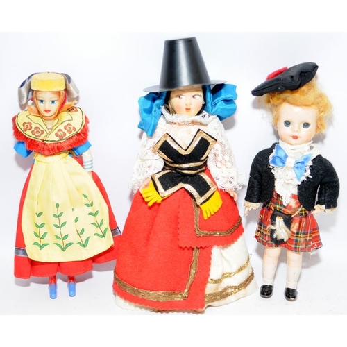 108 - Small collection of dolls to include a vintage sailor and others