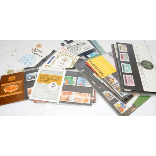 224 - Collection of stamps, postcards and Royal Mail presentation packs