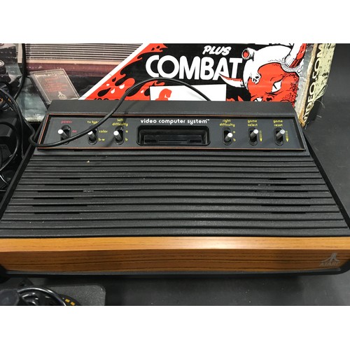 90 - Atari Video Computer System with original box, two joysticks and a pair of paddle controllers.