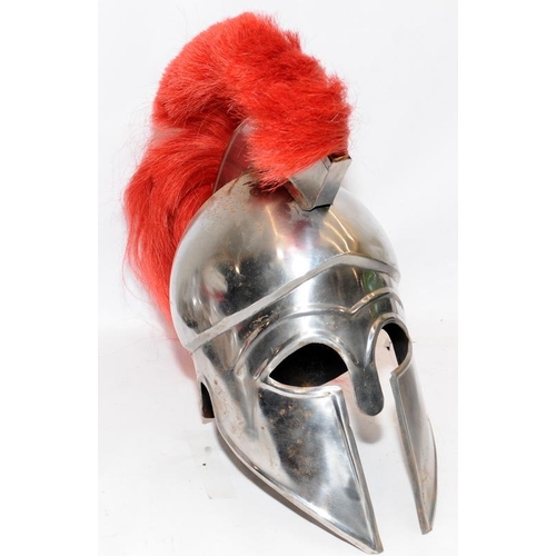 124 - Reproduction pressed metal Spartan/Greek war helmet