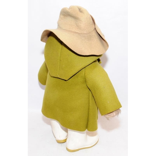 56 - Vintage Paddington Bear soft toy with green duffle coat and white wellies. 50cms tall