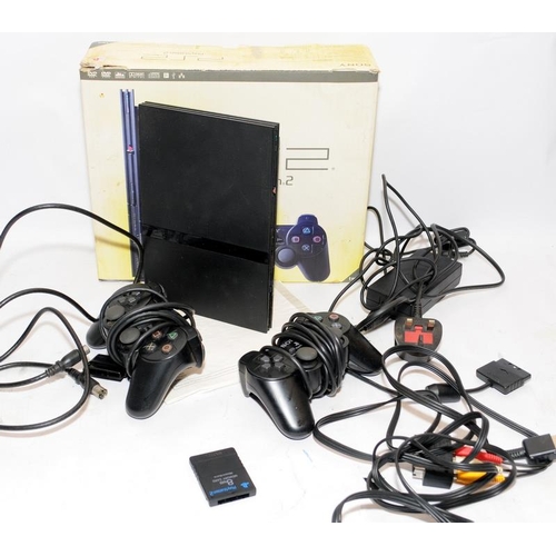 103 - Boxed Playstation One and Playstation 2. Complete with a number of PS1 and PS2 games. Lot also inclu... 