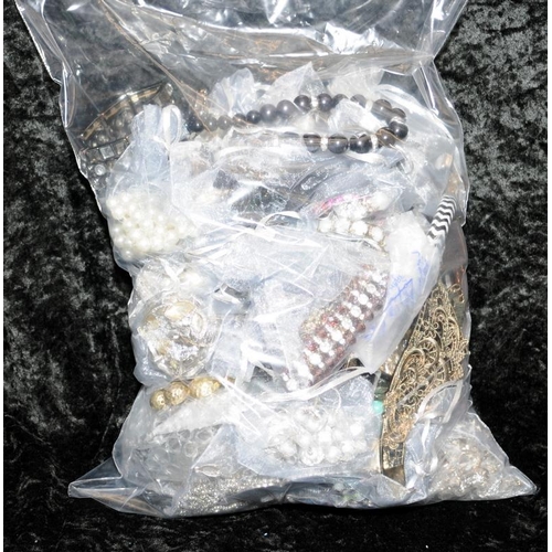 319 - Large bag of mixed costume jewellery