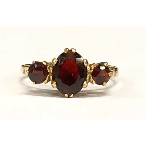 379 - 9ct gold garnet ring size O ref 942005.