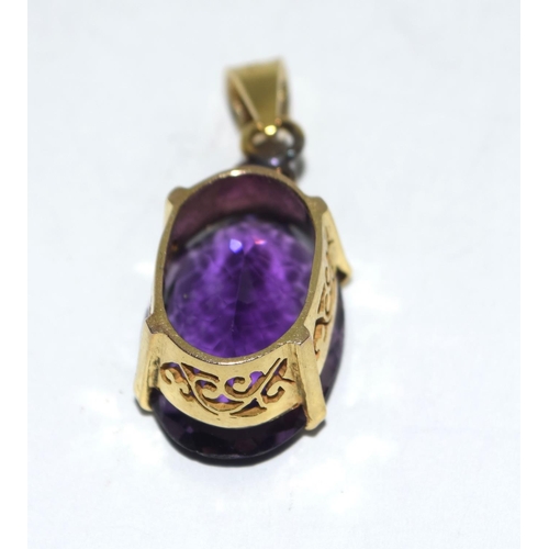 449 - Yellow metal Amethyst and Diamond pendant.