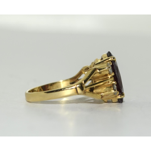 370 - 14ct gold Garnet and Diamond ring. Size Q.