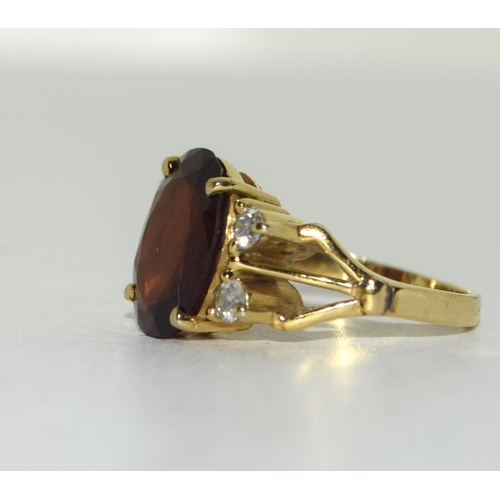 370 - 14ct gold Garnet and Diamond ring. Size Q.