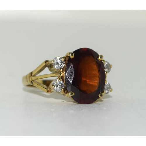 370 - 14ct gold Garnet and Diamond ring. Size Q.