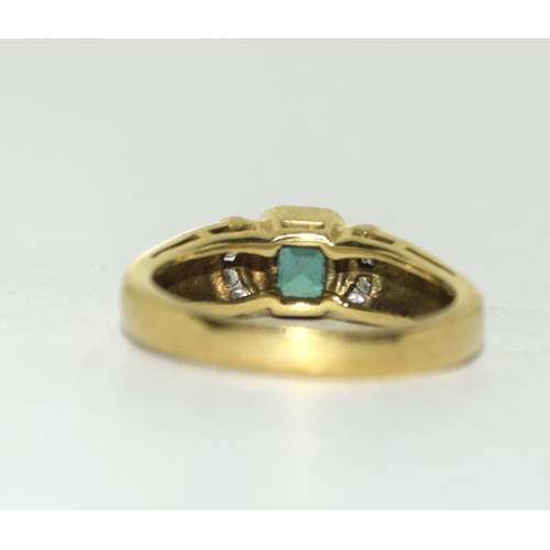 431 - 18ct Gold Emerald and Diamond ring. Size J.