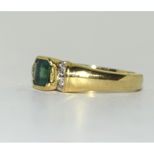 431 - 18ct Gold Emerald and Diamond ring. Size J.