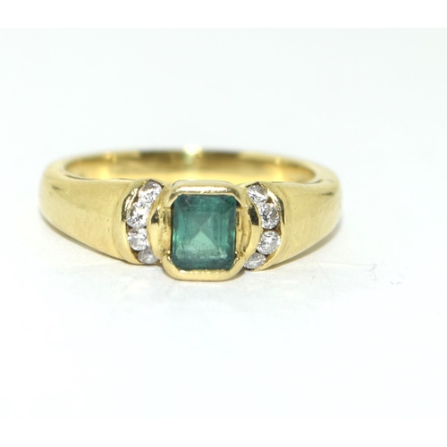 431 - 18ct Gold Emerald and Diamond ring. Size J.