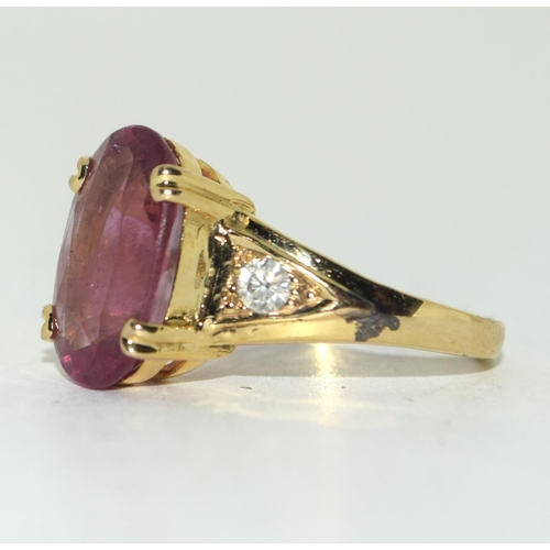 435 - 14ct Diamond and Pink Tourmaline ring. Size Q.