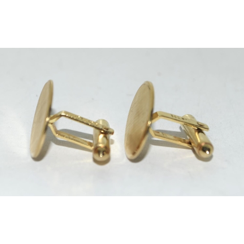 440 - Pair of 14ct Gold cuff links together with 22ct Gold Wedding band, Size U.