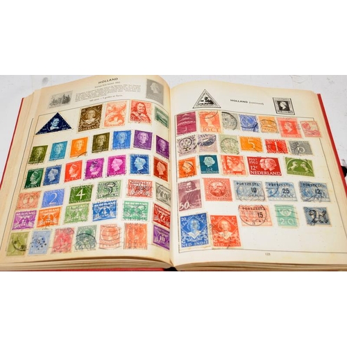 228 - A collection of vintage schoolboy stamp albums containing a good variety of world stamps. Six albums... 