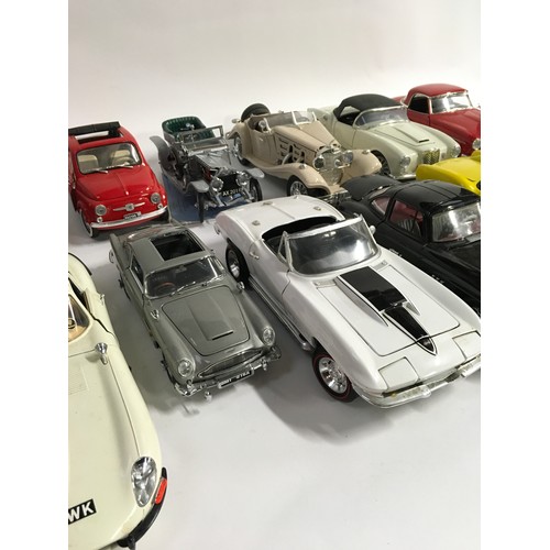 37 - Collection unboxed diecast models to include Burago, Franklin Mint, Solido and ERTL. (14)