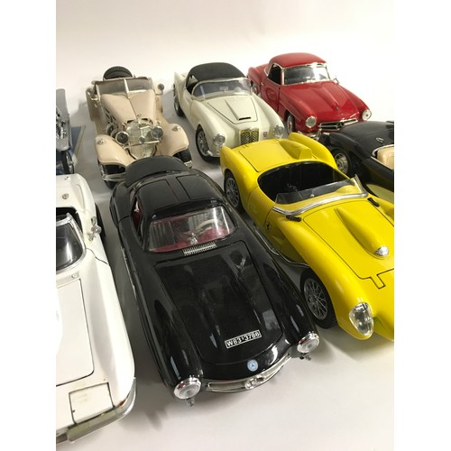 37 - Collection unboxed diecast models to include Burago, Franklin Mint, Solido and ERTL. (14)