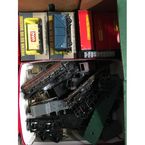 98 - 2 trays of OO gauge items to include loco chassis and bodies, rolling stock, electrical clips etc. G... 