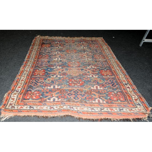 289 - A vintage Caucasian rug 180x120cm