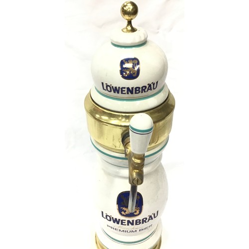 111 - Large Lowenbrau premium beer decanter. 25” in height.