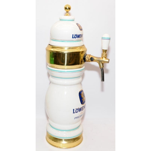 111 - Large Lowenbrau premium beer decanter. 25” in height.