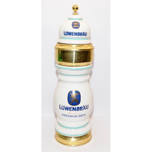 111 - Large Lowenbrau premium beer decanter. 25” in height.