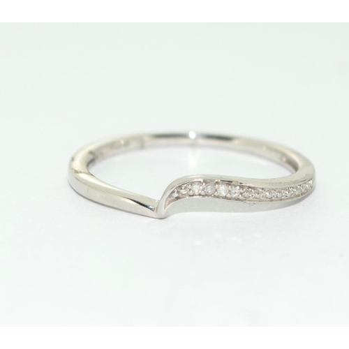 484 - Diamond 9ct white gold twist ring size O+