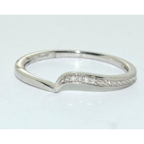 484 - Diamond 9ct white gold twist ring size O+