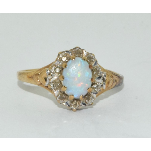 464 - Opal/diamond 9ct gold ring size O