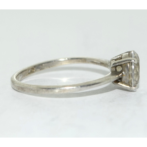 413 - A 925 silver solitaire ring Size R 1/2.