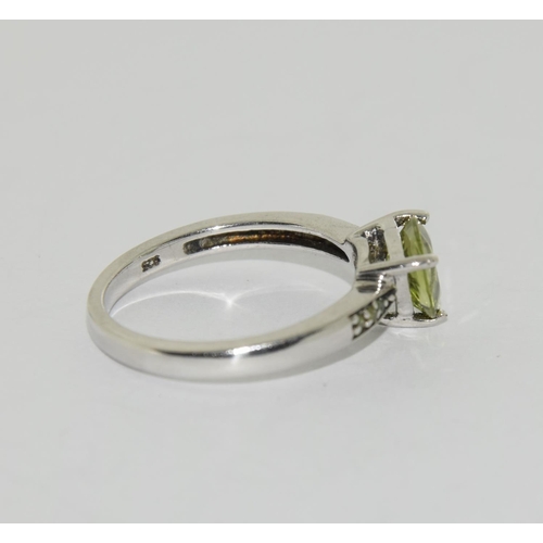 408 - Peridot 925 silver earrings and ring size N