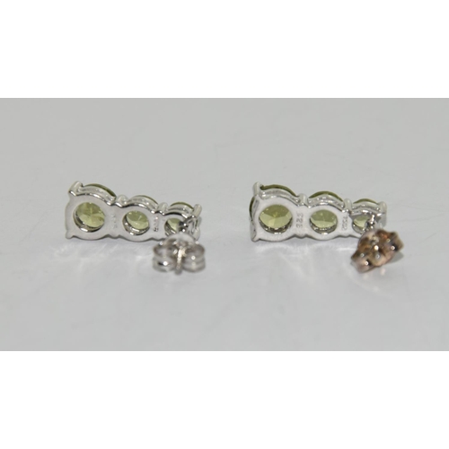 408 - Peridot 925 silver earrings and ring size N