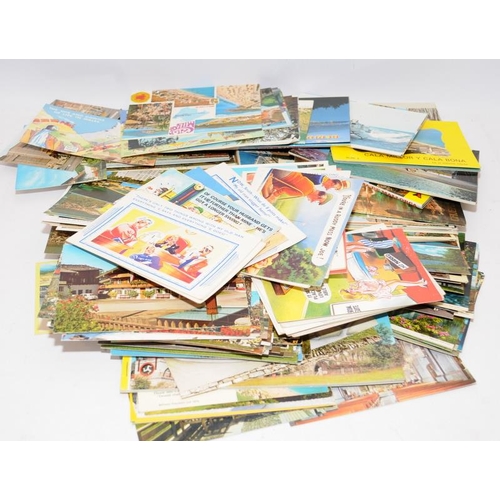 235 - Large quantity of vintage cigarette and tea cards, many sorted into sets c/w a quantity of postcards... 