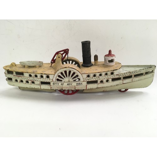 179 - Cast Iron model of a paddle boat, believed to be Wilkins.