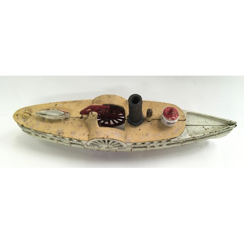 179 - Cast Iron model of a paddle boat, believed to be Wilkins.