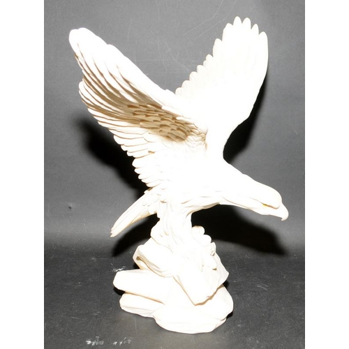 47 - Large alabaster figure of an eagle signed A Giannelli 35cms tall with 35cms wingspan